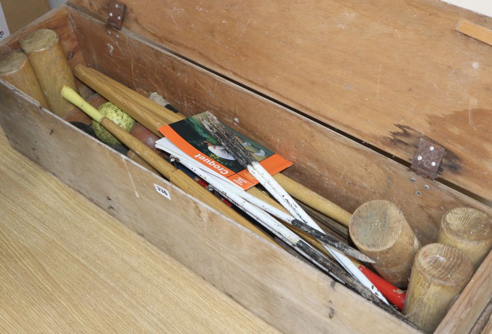 A cased croquet set